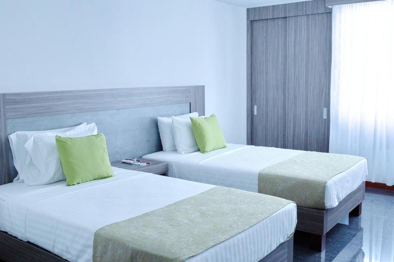Hotel Be Suites Cali Exterior foto